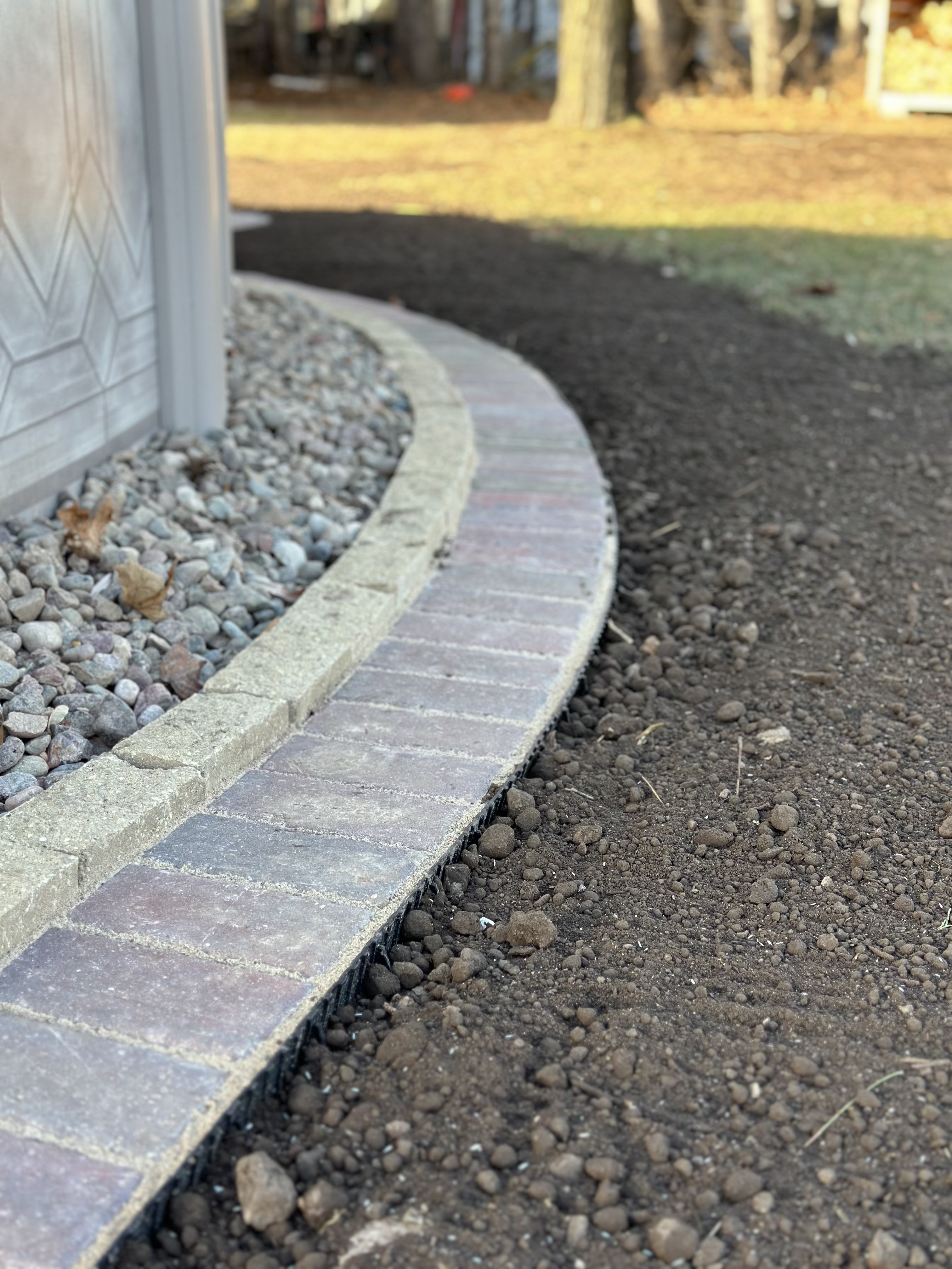 Landscape edging and curbing by Precision Property Works, LLC