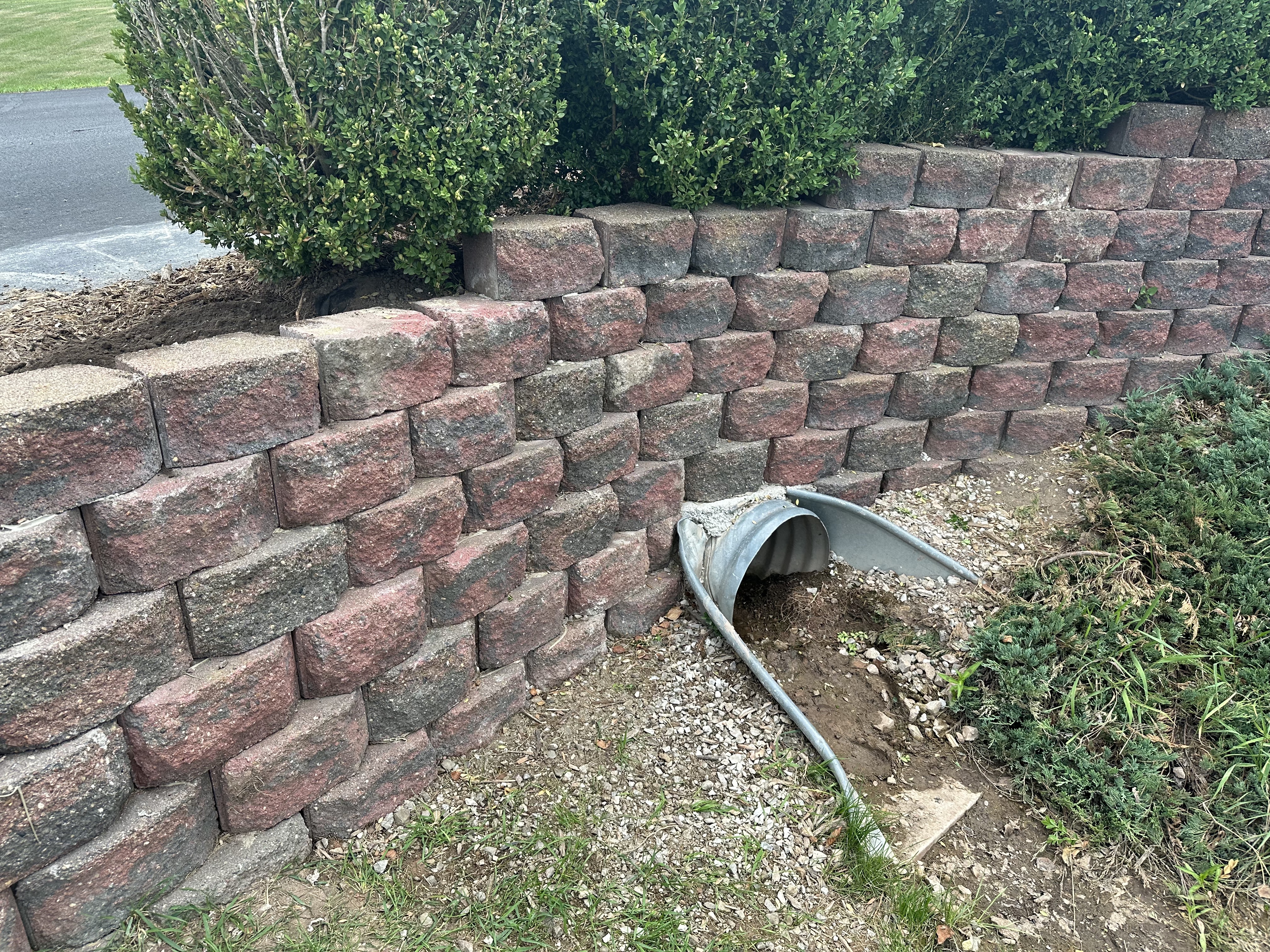 Retaining wall installation by Precision Property Works, LLC